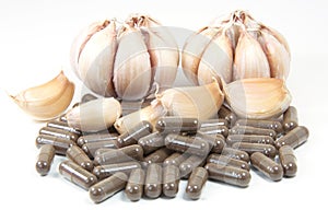 Garlic herbal capsules,oral medicine,alternative medicine isolated on white background.