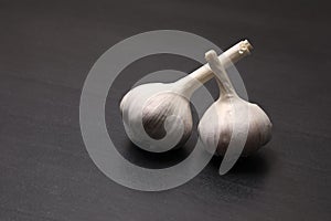 Garlic  on black background, close-up