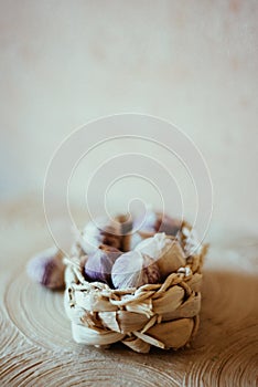 Garlic in a light wicker basket.