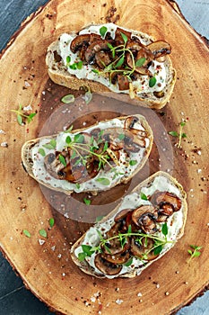 Garlic mushroom toast with creamy herbed ricotta chees spread