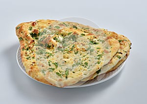 Garlic Nan, A delicious Indian flat bread baked in clay oven