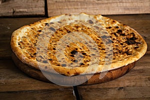 Garlic pizza bread on wood table