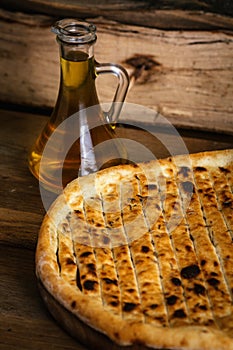 Garlic pizza bread on wood table