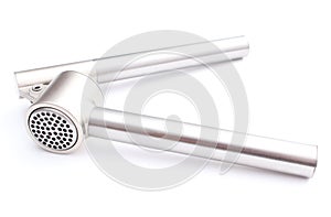 Garlic press isolated on white background