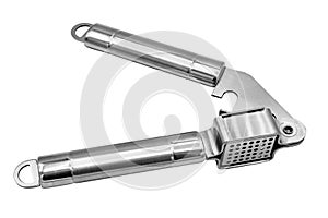 Garlic press on white background