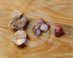 Garlic and red, spices that are often used when cooking.