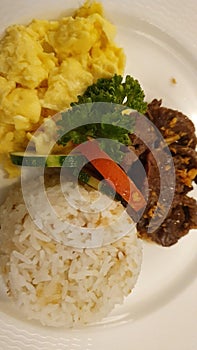 Garlic Rice with Scrambled Egg and Beef Adobo