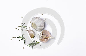 garlic, rosemary, peppercorn isolated on white background
