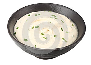 garlic sauce in black bowl isolated on white background