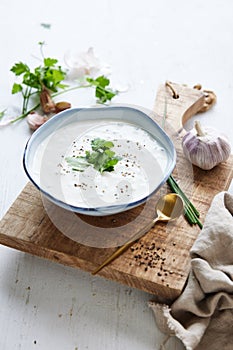 Garlic sauce with fresh parsley