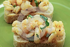 Garlic shrimp tapas on sourdough bread