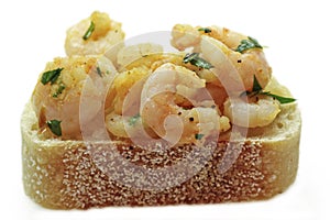 Garlic shrimp tapas on sourdough bread