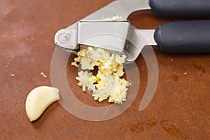 Garlic squeezed from a press.