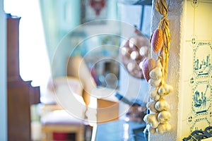 Garlic and textil heart decorations in the kitchen