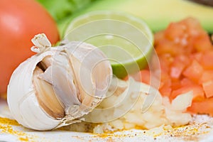 Garlic, tomato, lime photo