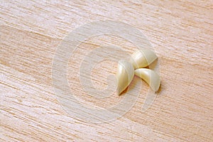 Garlic on wood background