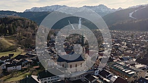 Garmisch Partenkirchen at Winter. Aerial view of Bavarian village in Alps mountains. Sunny day in Germany, Europe.