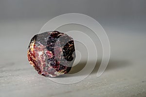 garnet mineral stone on a white background close up