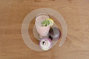 Garnish Glass Filled With Starapple Juice
