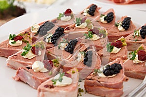 Garnished with blackberry pate