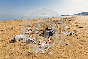 Garrbage on beautiful Golden beach in Karpasia, Cyprus