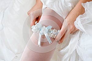 Garter on bride's leg