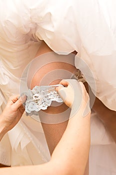 Garter on leg of bride