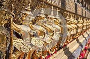 Garudas and nagas on external decorations of the Ubosoth, Wat Phra Kaew temple, Grand Palace, Bangkok, Thailand