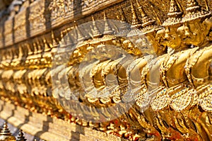 Garudas and nagas on external decorations of the Ubosoth, Wat Phra Kaew temple, Grand Palace, Bangkok, Thailand