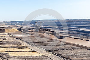 Garzweiler, Germany: Coal opencast mine with giant excavator in the pit