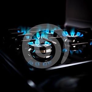 Gas burner with blue flames on black background.