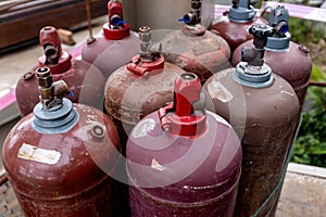Gas canisters used to provide fire for welding purposes in a building construction site