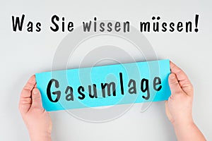 Gas commission is standing in german language on the paper, new fee regualtion in Germany, risk for impoverishment