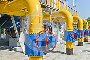 Red handle gate valve with steel pipe on gas compressor station