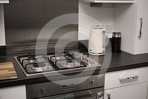 Gas cooker in modern kitchen - cleaning home appliances