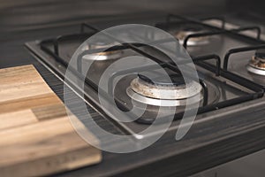 Gas cooker in modern kitchen - cleaning home appliances