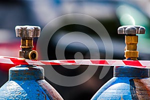 Gas cylinders tied with protective tape