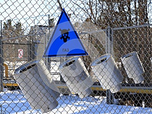 Gas distribution station fencing with fire safety equipment