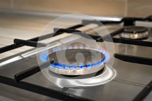 Gas flame stove on the home steel or iron burning, kitchen cook