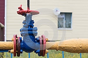 Gas flanged valve with pipe in nature.