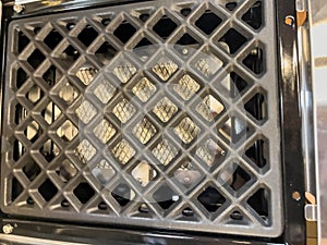Gas grill. Gas grill grate. Metal grill.