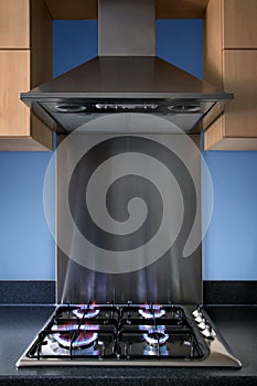 Gas hob and extractor hood
