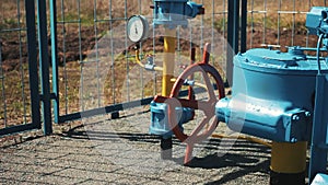 The gas industry. Pipeline with a manometer and a shut-off valve. Transportation and storage of gas and oil products.