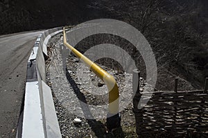 The gas main in the mountains along the road.