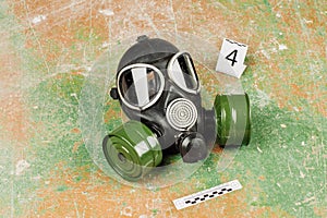 Gas mask lying on the floor. crime scene