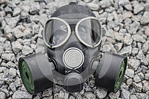 Gas mask on stone background