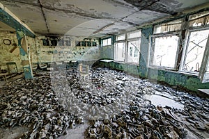 Gas masks on the floor in the middle school in Pripyat, Chernobyl exclusion zone. Nuclear catastrophe