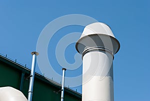 Gas pipe against the blue sky.