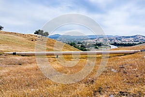Gas pipeline going through the golden hills of south San Francisco bay area, San Jose, California