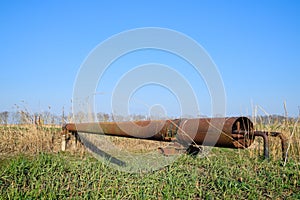 Gas pipeline through irrigation canal in a protective steel pipe